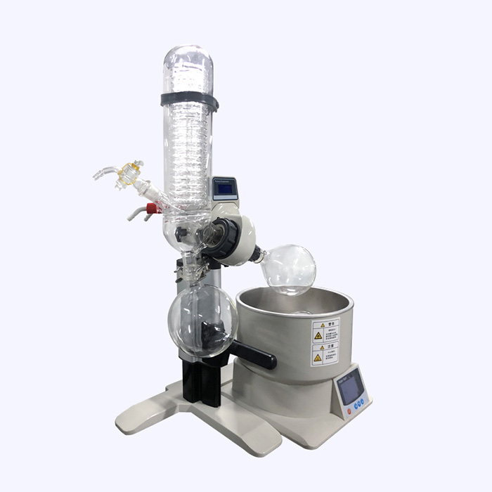 Rotary evaporator with vertical condenser assembly